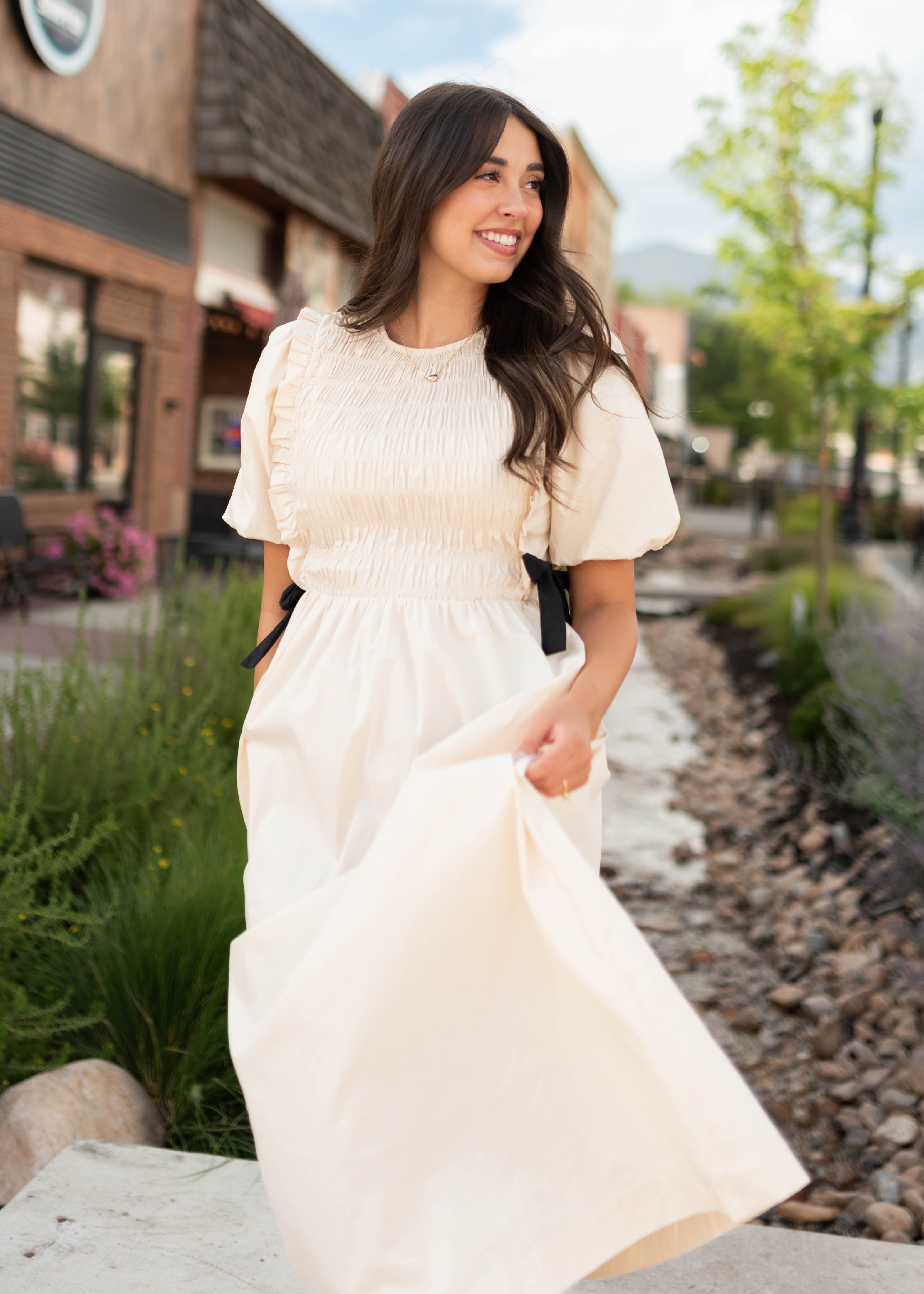 Nadya Cream Smocked Dress With Black Bows
