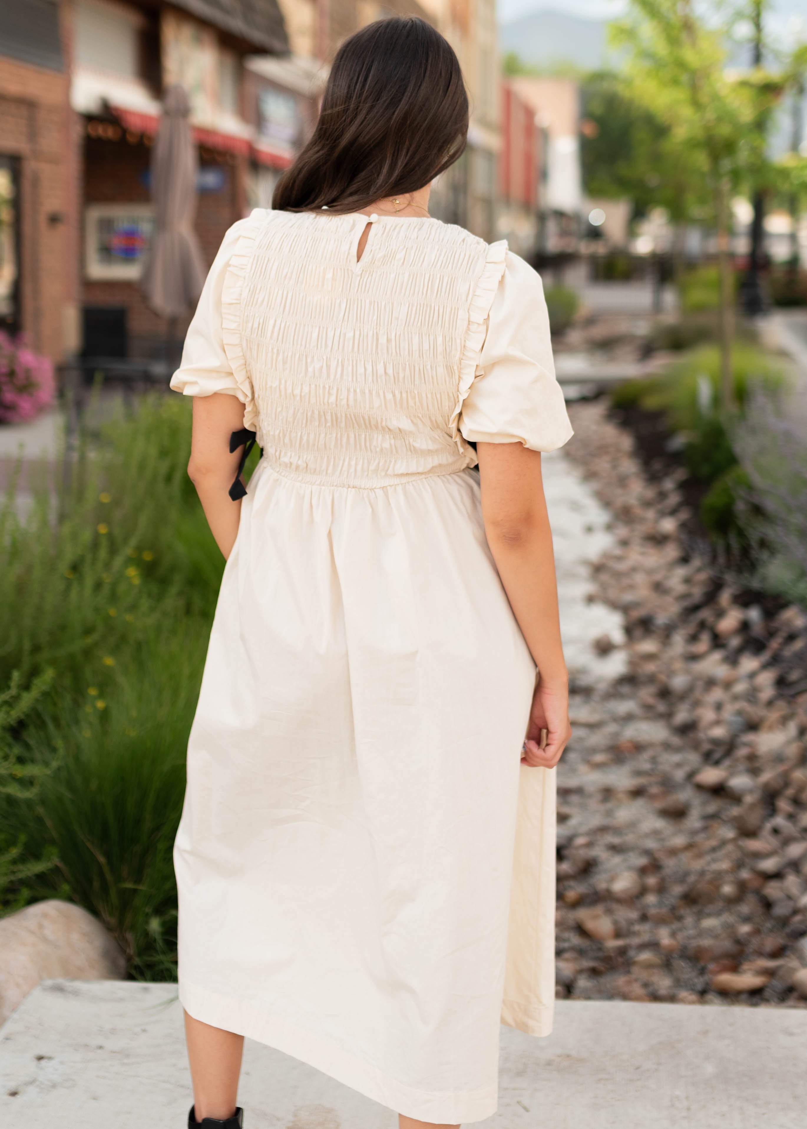 Nadya Cream Smocked Dress With Black Bows