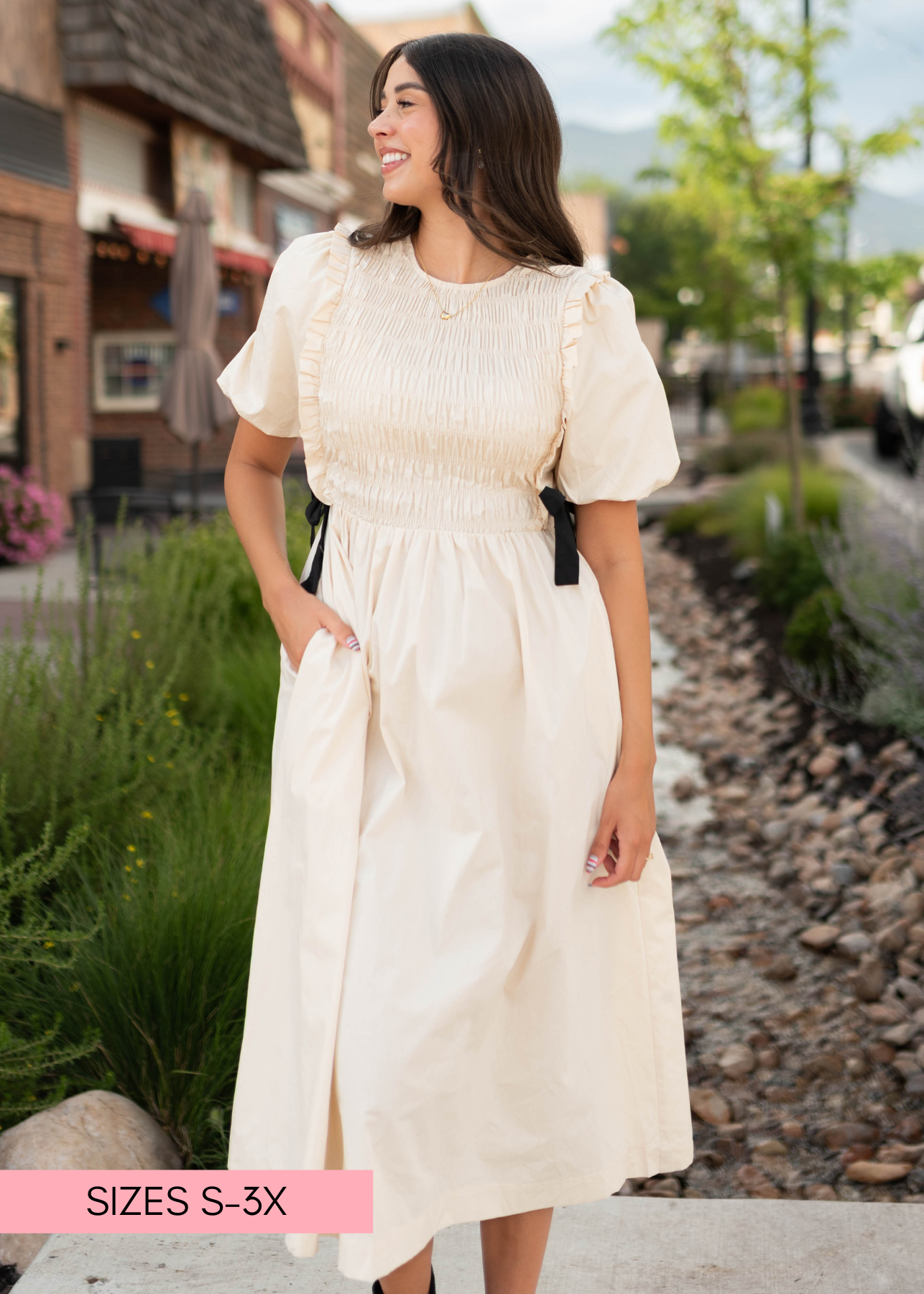 Nadya Cream Smocked Dress With Black Bows