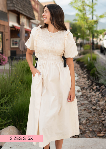 Nadya Cream Smocked Dress With Black Bows